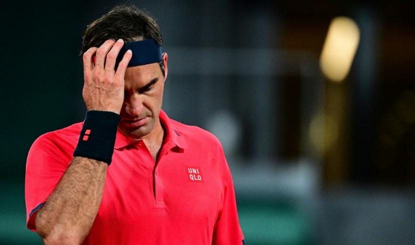 Federer beaten by Auger-Aliassime in Halle